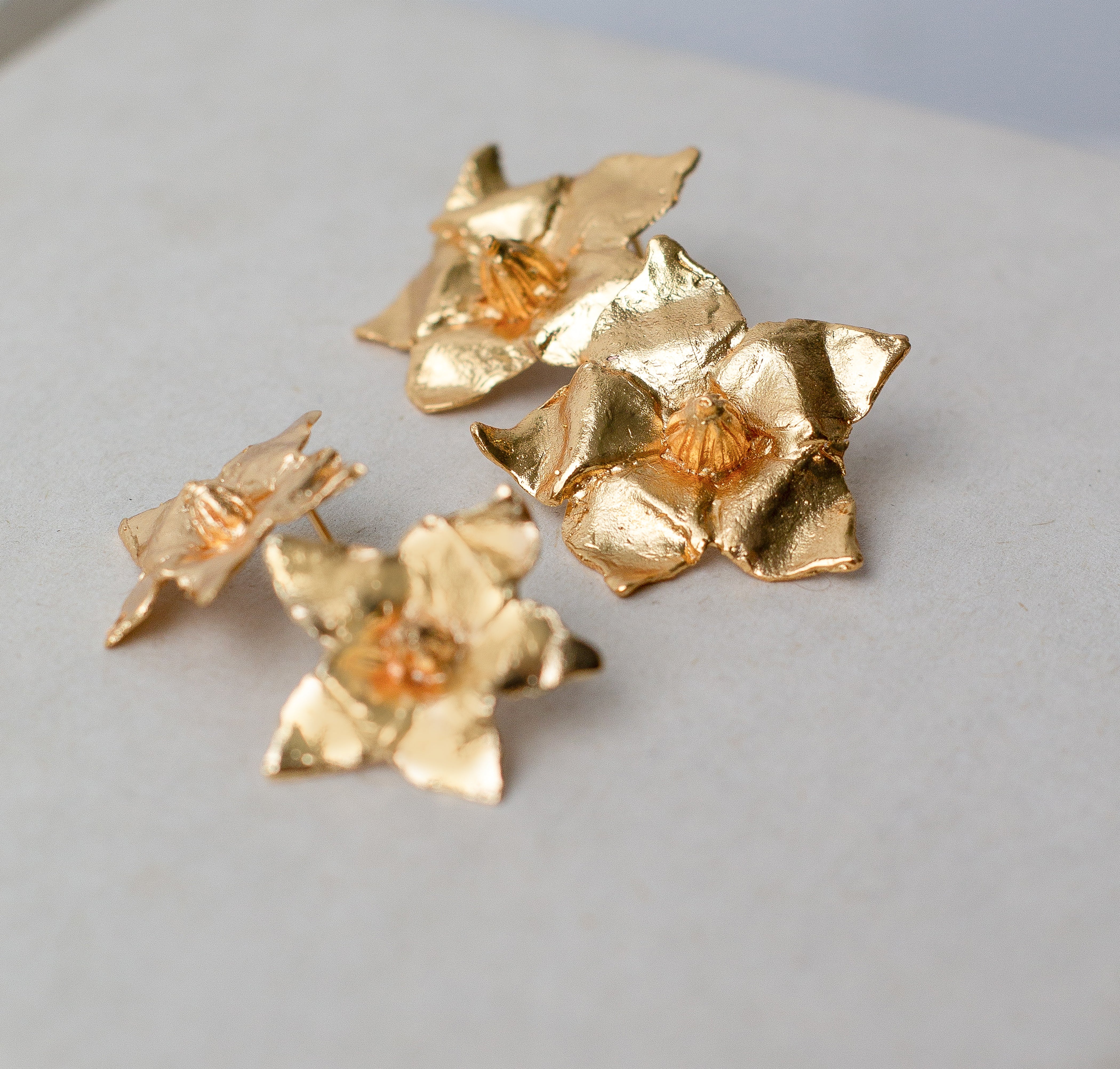 Arete flor papa