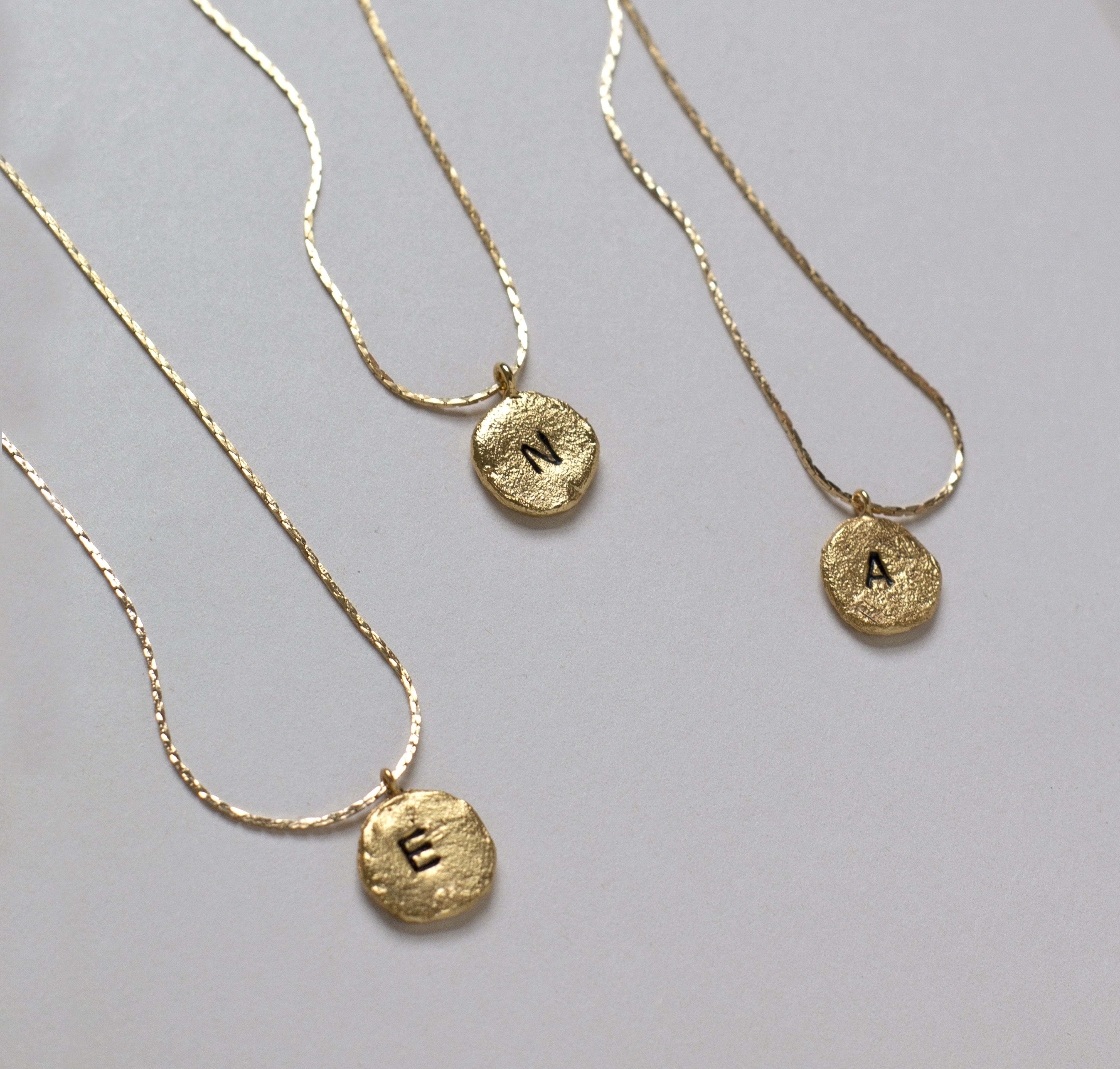 Collar Moneda inicial