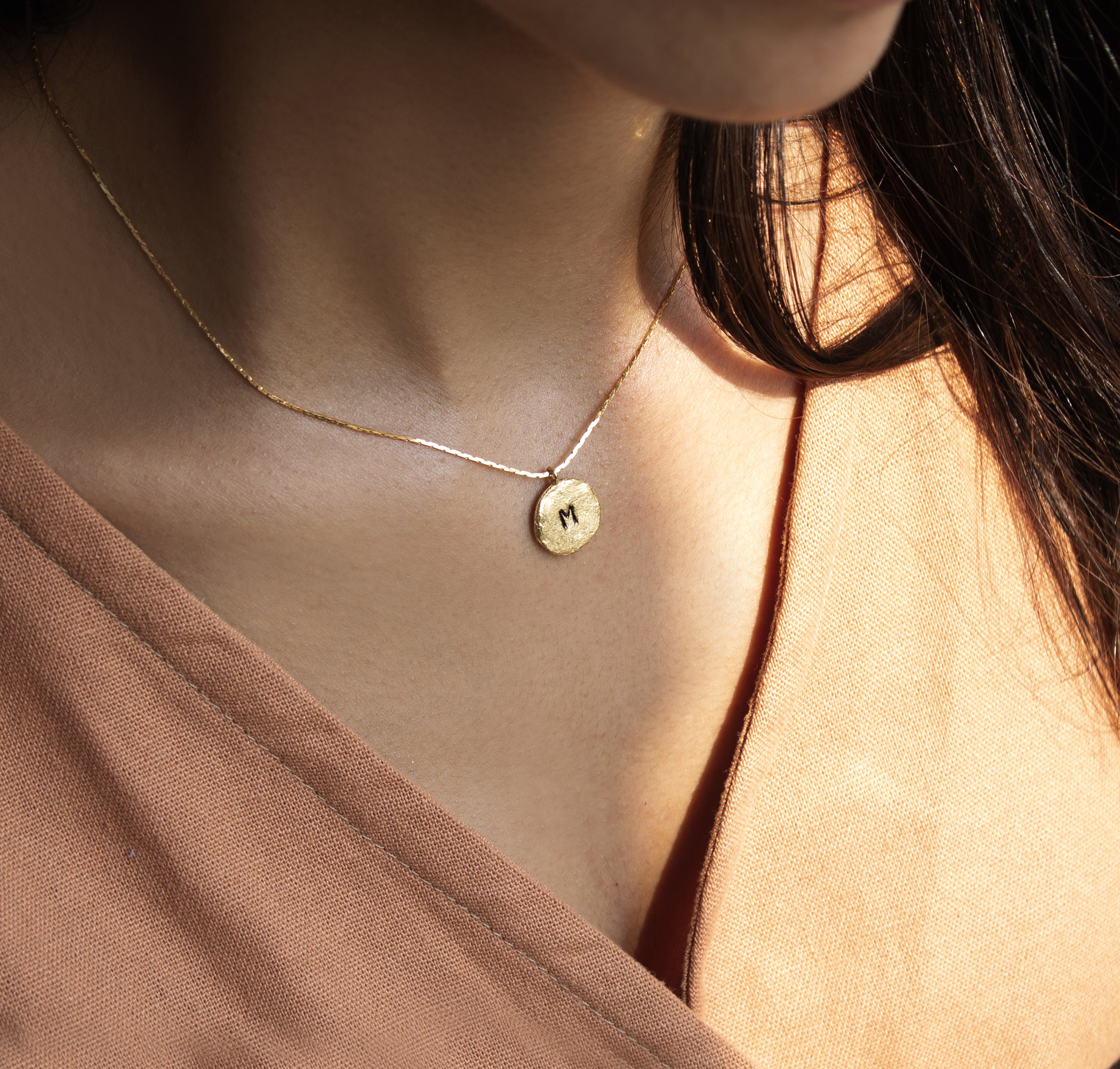 Collar Moneda inicial